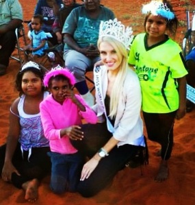 Beauty with a Purpose.  Erin with the kids of Lilla Community